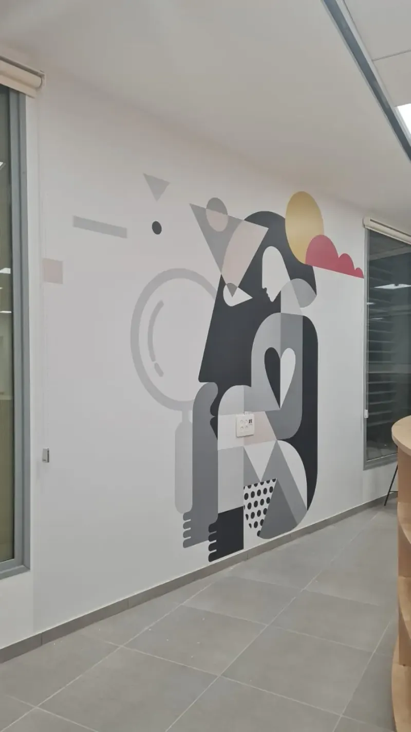 Abstract figurative wall art in indoor office — SignWorks
