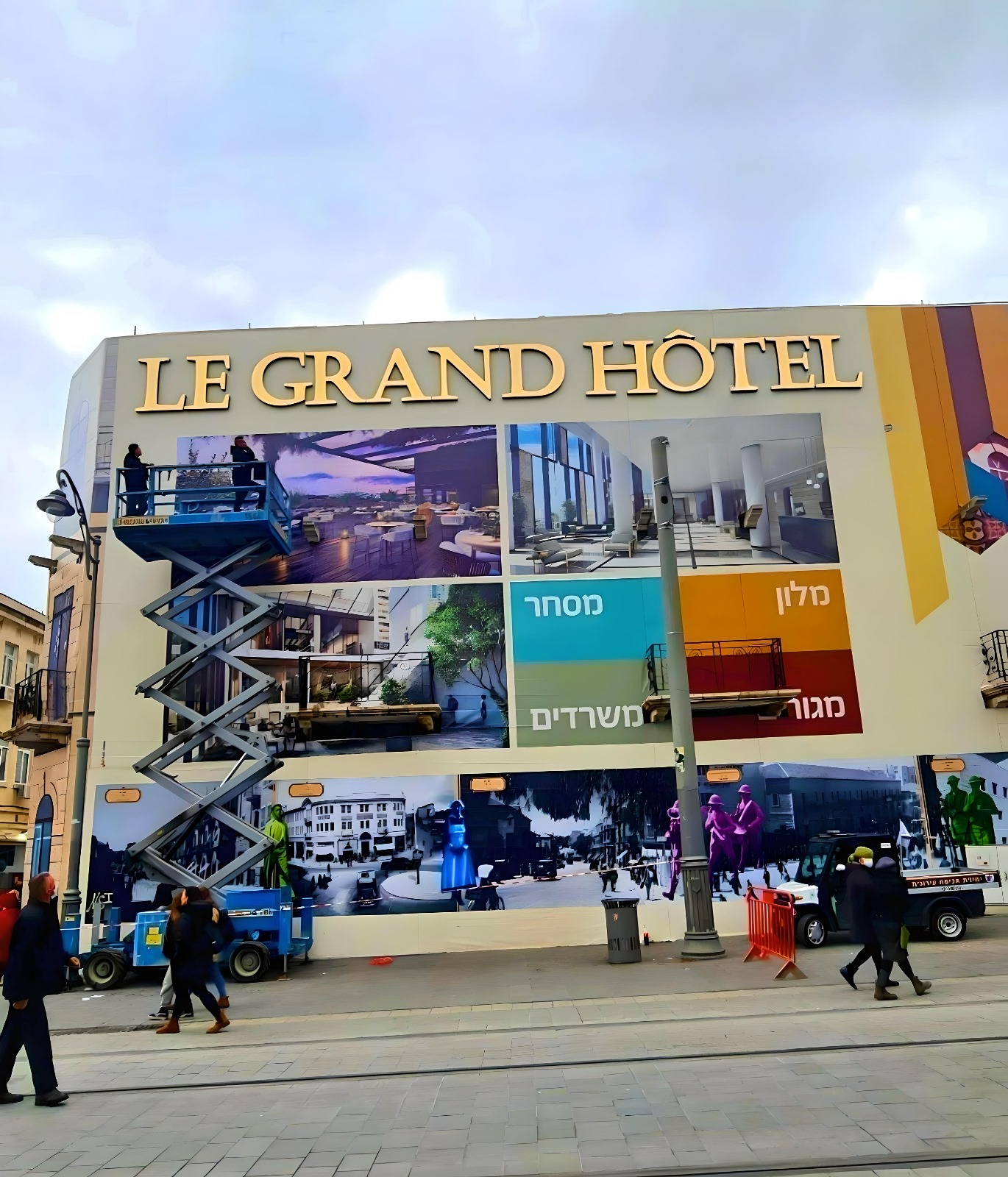 Le Grand Hotel building with illuminated channel letters — large-scale property branding