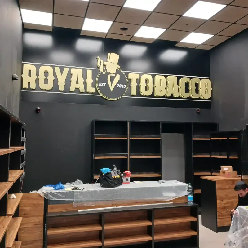 Royal Tobacco interior store sign above product shelves — SignWorks