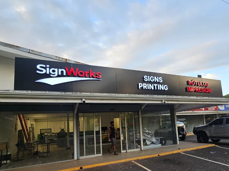 SignWorks shop by day in La Garita Nueva, Guanacaste, with 3D letters on a black facade